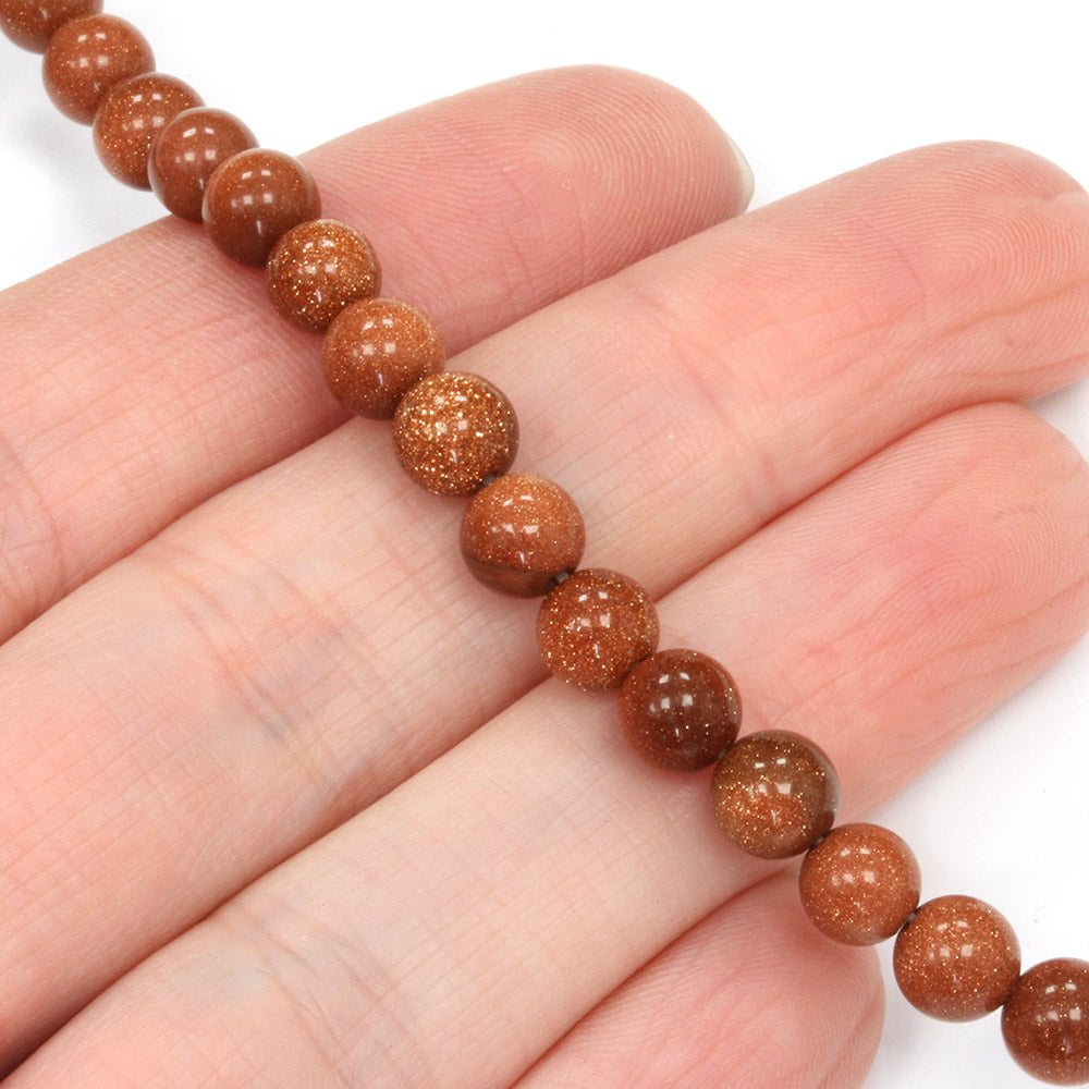 Goldstone 6mm Round - 40cm Strand