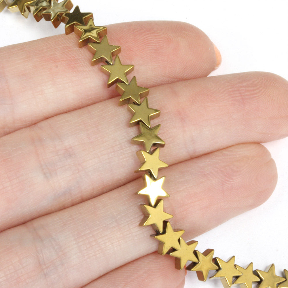 Hematite Stars Gold 6mm - 35cm Strand