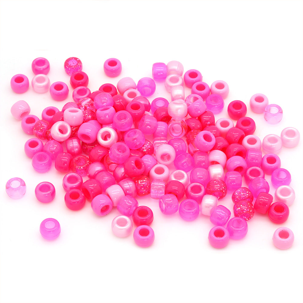 kids plastic mix of pink coloured  pony beads with large holes