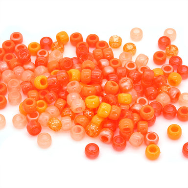 kids plastic mix of orange coloured  pony beads with large holes